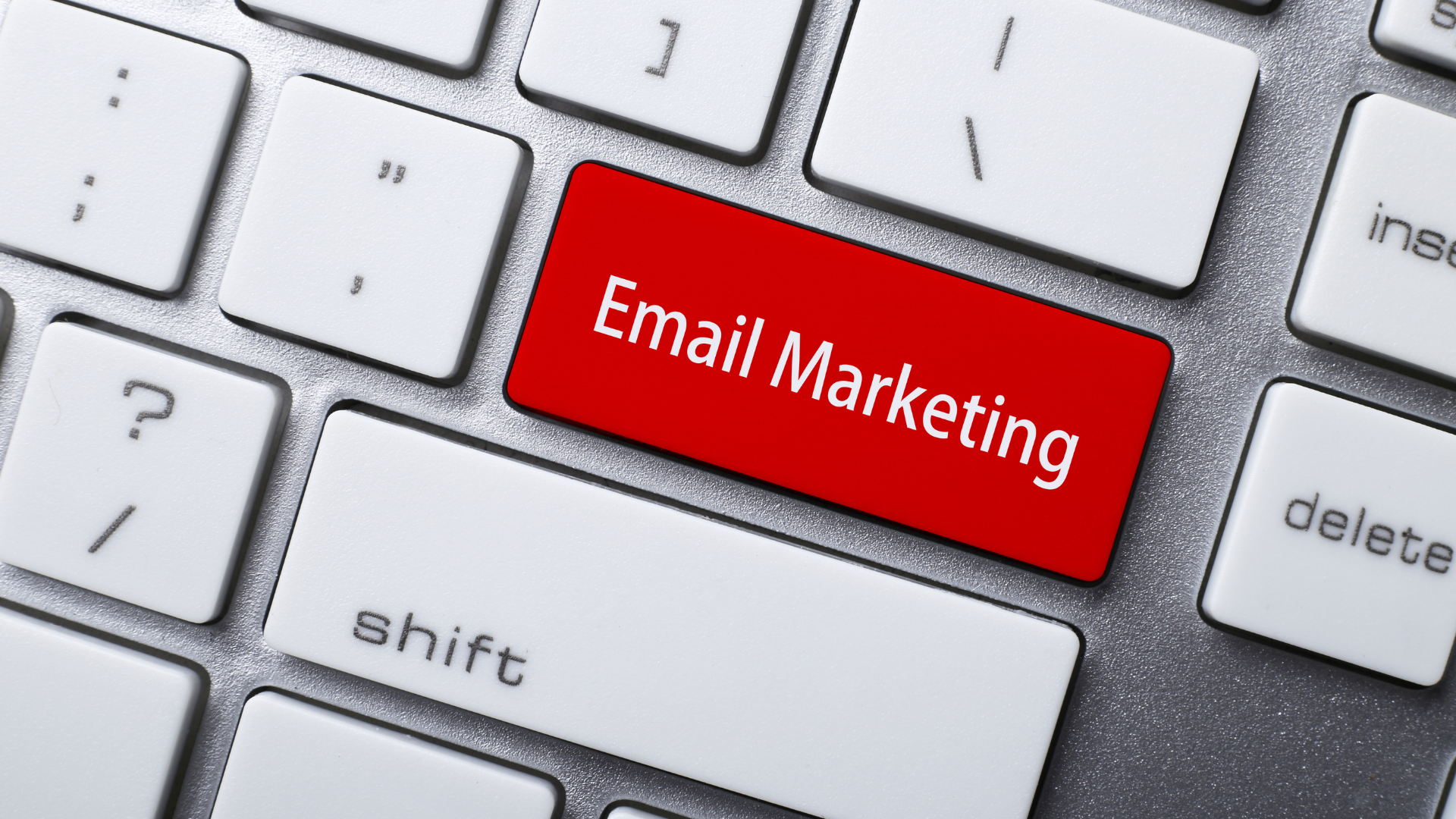 Email Marketing concept. Phrase on blue computer Keyboard Key